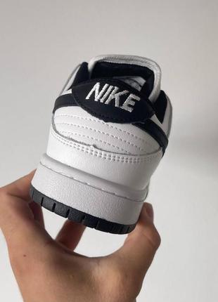 Жіночі кросівки nike dunk low retro white black v2 / smb2 фото