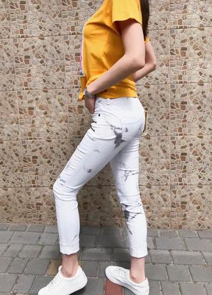 Жіночі білі джинси під мармур2 фото