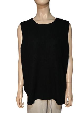 Жилет, зв'язана жилетка з розрізами збоку, із замочками