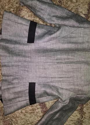 Прелестнейший пиджачок. благородного серого цвета.2 фото