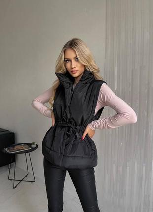 Женская жилетка