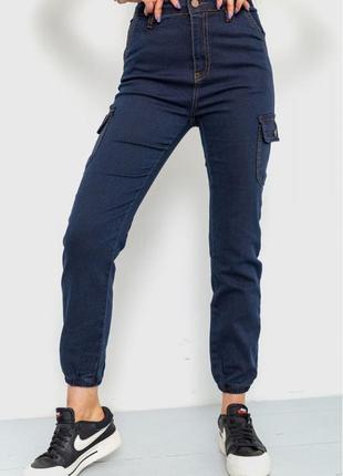 Стильні темно-сині жіночі джинси карго завужені жіночі джинси на манжетах джинси-карго сині жіночі джинси з манжетами демісезонні джинси на резинках2 фото