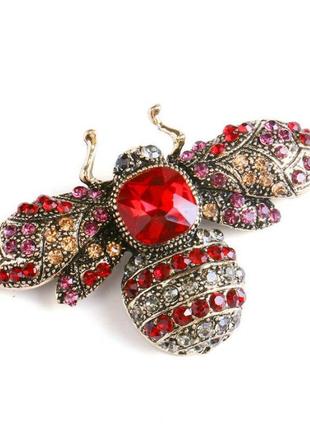 Брошка: буля- бджілка золотиста в камені червона