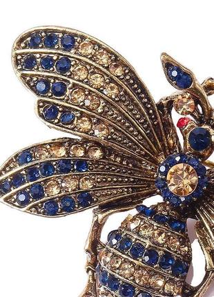 Брошь булавка бабочка с золотисто-синими камнями золотистая2 фото