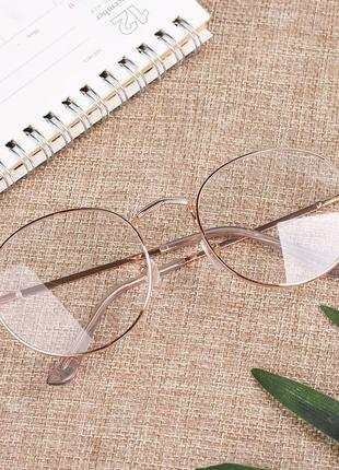 Окуляри нульовки іміджеві в золотистої металевій оправі прозорі