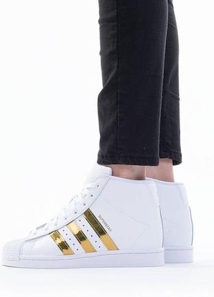 Женские кроссовки сникерсы на танкетке adidas superstar up fw39054 фото