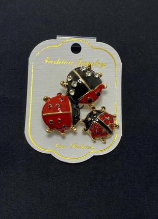 Брошь булавка божьи коровки с камнями золотистая / красно-черная