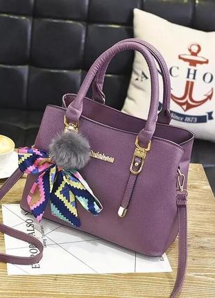 Женская стильная новая кожаная сумка сумочка с ремешком длинными ручками2 фото