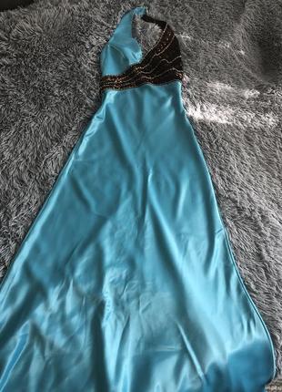 Продам свою випускну сукню оздоблену камінням, атласне, блакитне