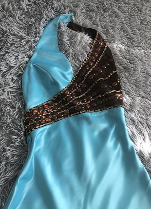 Продам свою випускну сукню оздоблену камінням, атласне, блакитне