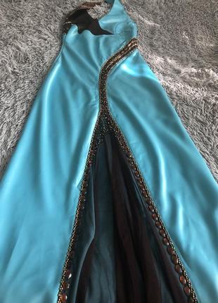 Продам свою випускну сукню оздоблену камінням, атласне, блакитне