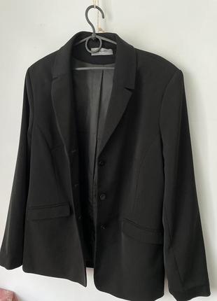 Піджак  жіночий розпродаж жакет чорний класика довгий рукав розмір m/l10 фото