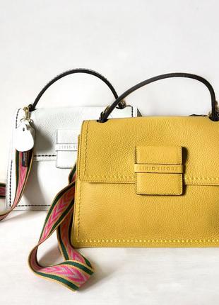 Стильная кожаная сумка итальянского бренда ,действующая коллекция!1 фото