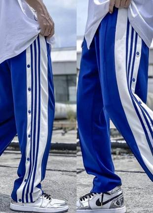 Спортивні штани на кнопках з лампасами