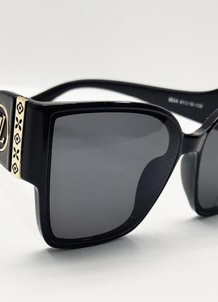 Стильные женские черные солнцезащитные очки5 фото