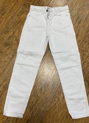 Білі джинси «з потертостями» для дівчинки