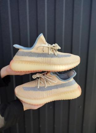 Жіночі кросівки adidas yeezy  boost 350 v2 yellow blue1 фото