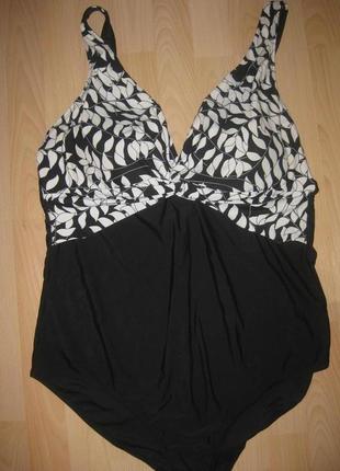 Фірмовий купальник 20 р).