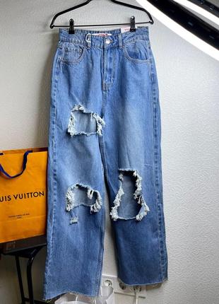 Джинсы широкие трубы