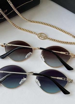 Стильные брендовые солнцезащитные женские очки20233 фото