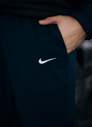 Спортивные штаны трикотаж синие nike (найк)5 фото