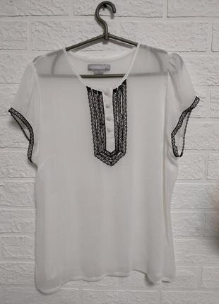 Блузка прозора легка