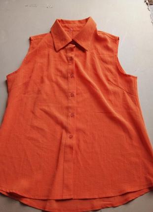 Оранжевая яркая блузка