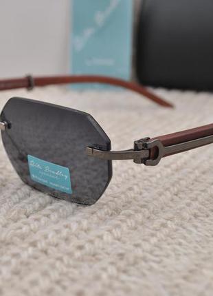 Фірмові вузькі сонцезахисні окуляри rita bradley polarized rb9014 з флексами