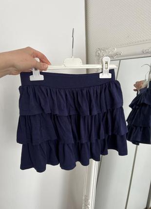 Короткая юбка с воланами. мини юбка с рюшами трикотажная юбка синяя1 фото