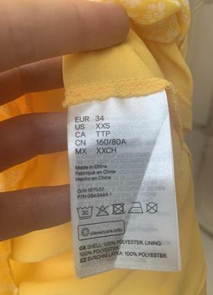 Жовта ніжна сукня з рюшами5 фото