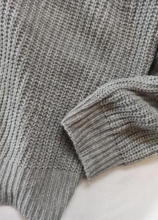 Серый свитер с узлом на спине4 фото