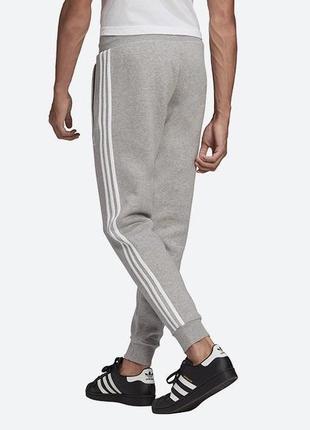 Спортивні штани чоловічі adidas originals 3-stripes pants gn35302 фото