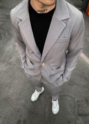 Стильний чоловічий костюм сірого кольору 5-703