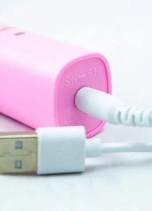 Електрична зубна щітка shuke sk-601 акумуляторна рожева5 фото