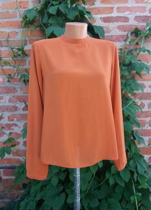 Стильная оранжевая блузка под горлышко на спинке молния1 фото