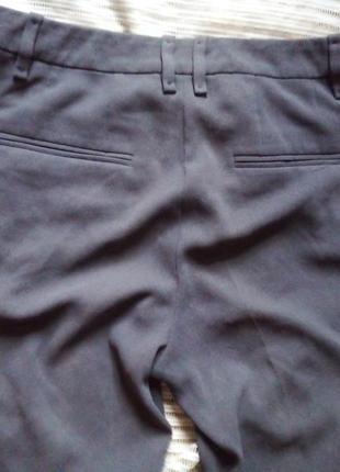 Серые зауженные брюки с манжетом6 фото