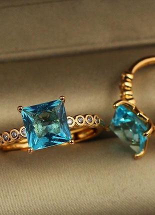 Кольцо xuping jewelry морская лазурь с голубым камнем р 16 золотистое