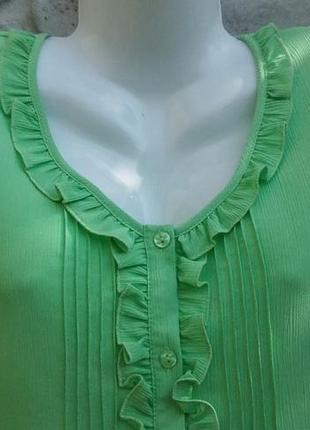 Красива, жіночна блуза салатового кольору4 фото