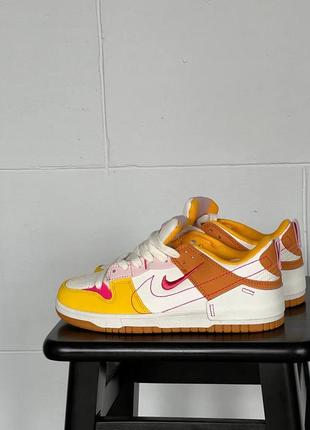 Жіночі кросівки nike dunk low disrupt 2 sunrise / smb1 фото