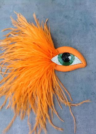 Брошка глаз оранжевый