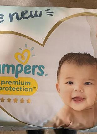 Підгузки pampers premium protection