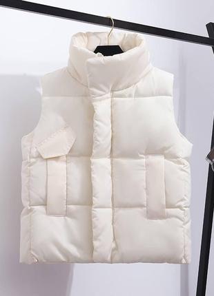Жіноча жилетка