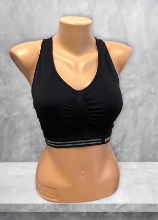 Безшовний спортивний топ із v-подібним вирізом ergeenomixx із паролоновими вставками.