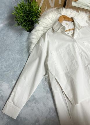 Белая асимметричная рубашка свободного кроя с разрезами4 фото