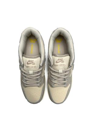 Жіночі кросівки nike sb dunk low retro silver beige7 фото