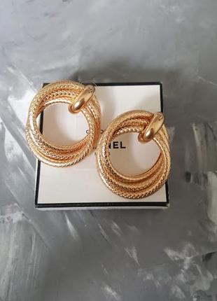 Великі фактурні зміїні золотисті сережки кільця кола тренд 20198 фото
