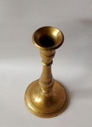 Старовинний бронзовий свічник на одну свічку.2 фото