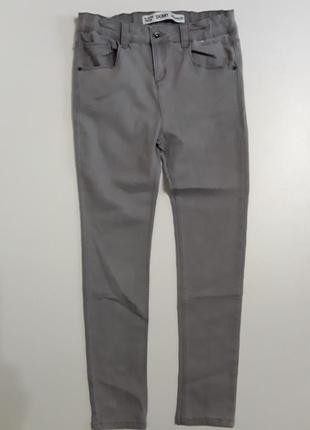 Фирменные джинсы скинни12-13 лет