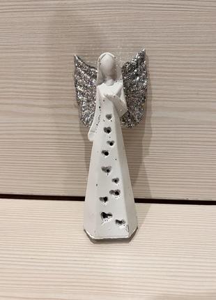 Статуєтка срібляста світиться на батарейках