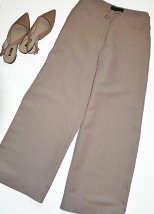 Широкие льняные брюки sayyes пудрового цвета.